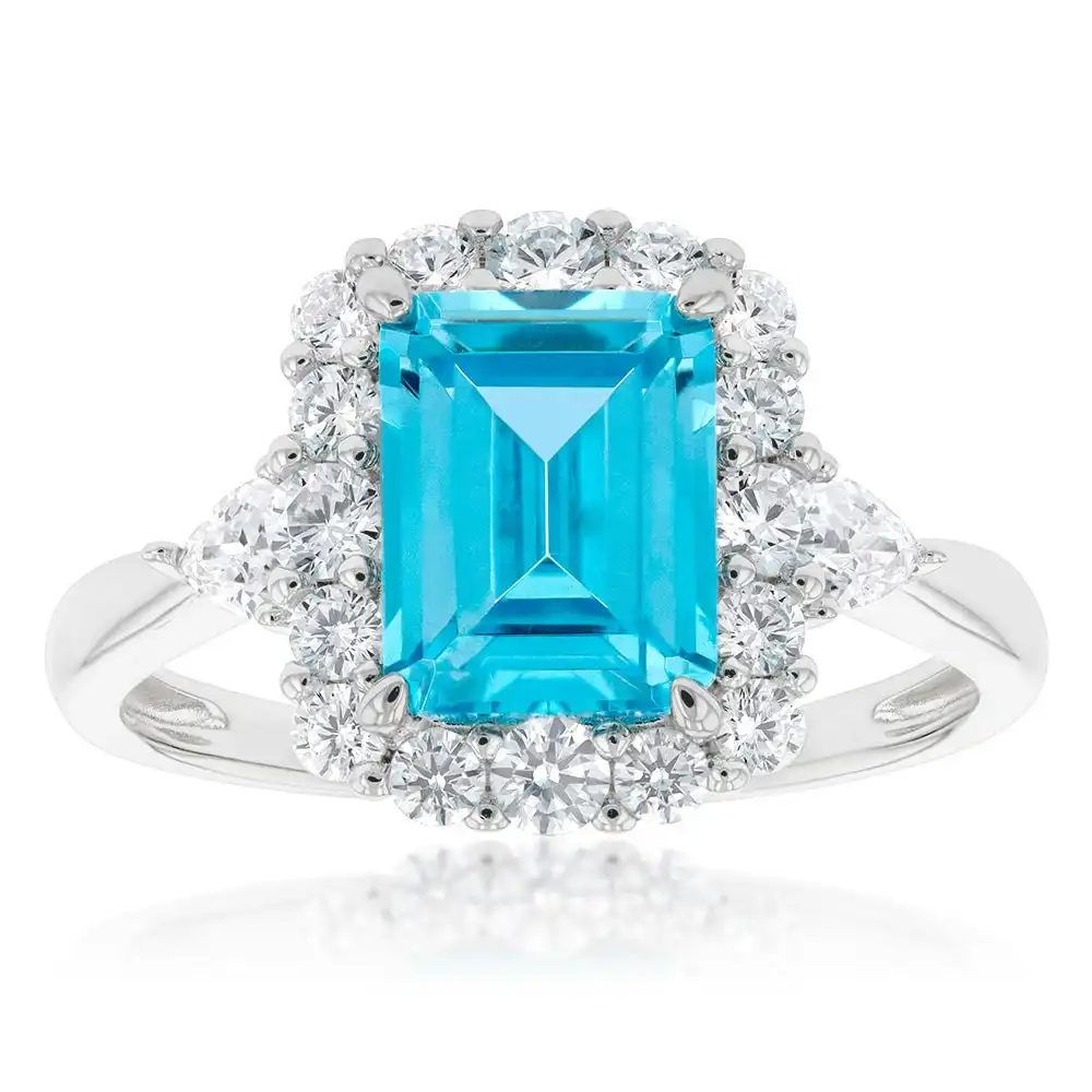 Sterling Silver Rhodium Plated White & Aquamarine Cubic Zirconia Emerald Cut Ring