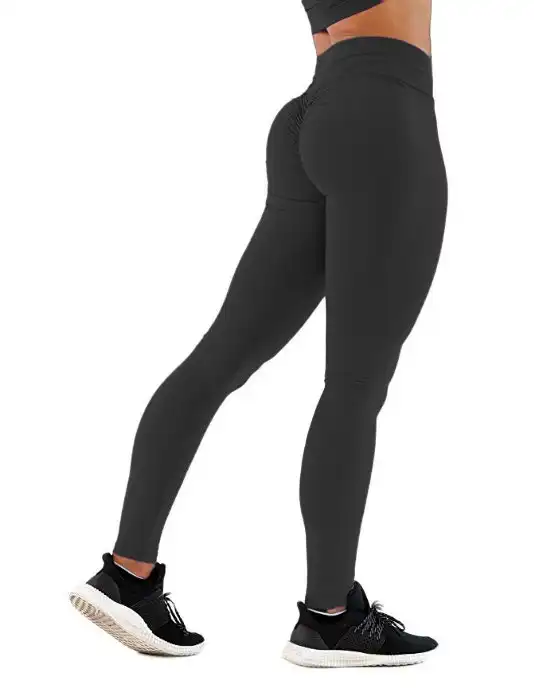 In The Style x Courtney Black activewear ruched bum leggings in pink | ASOS